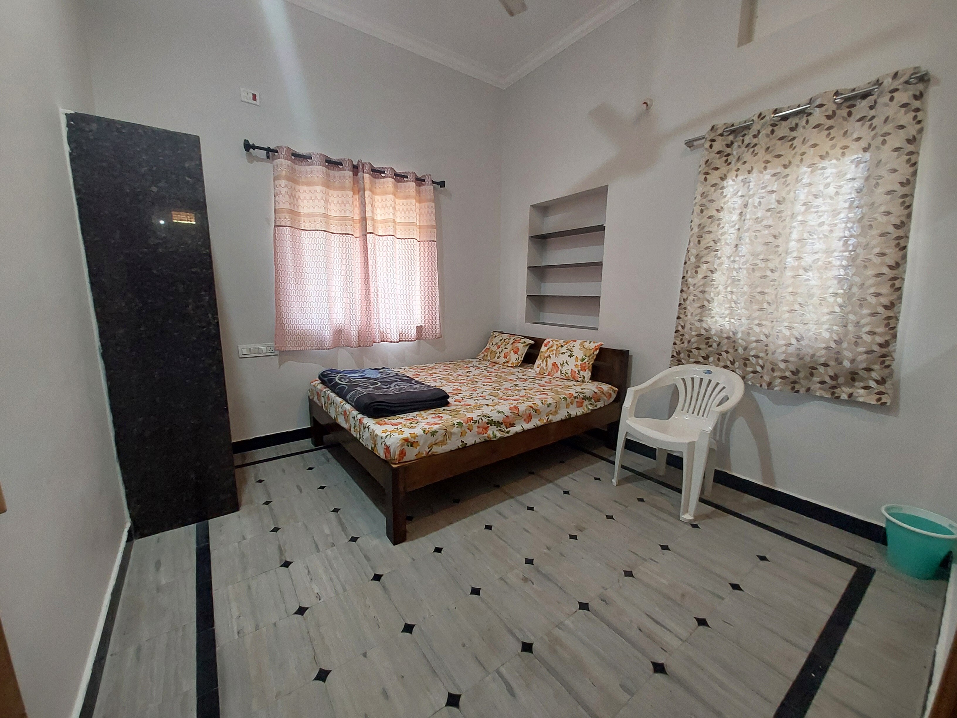Sreenivasa Nilayam Rooms - Tap to explore photos