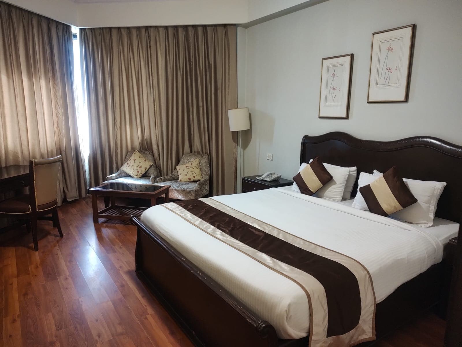 Luxera Hotel - Adjacent to Arjangarh Metro Station - Tap to explore photos