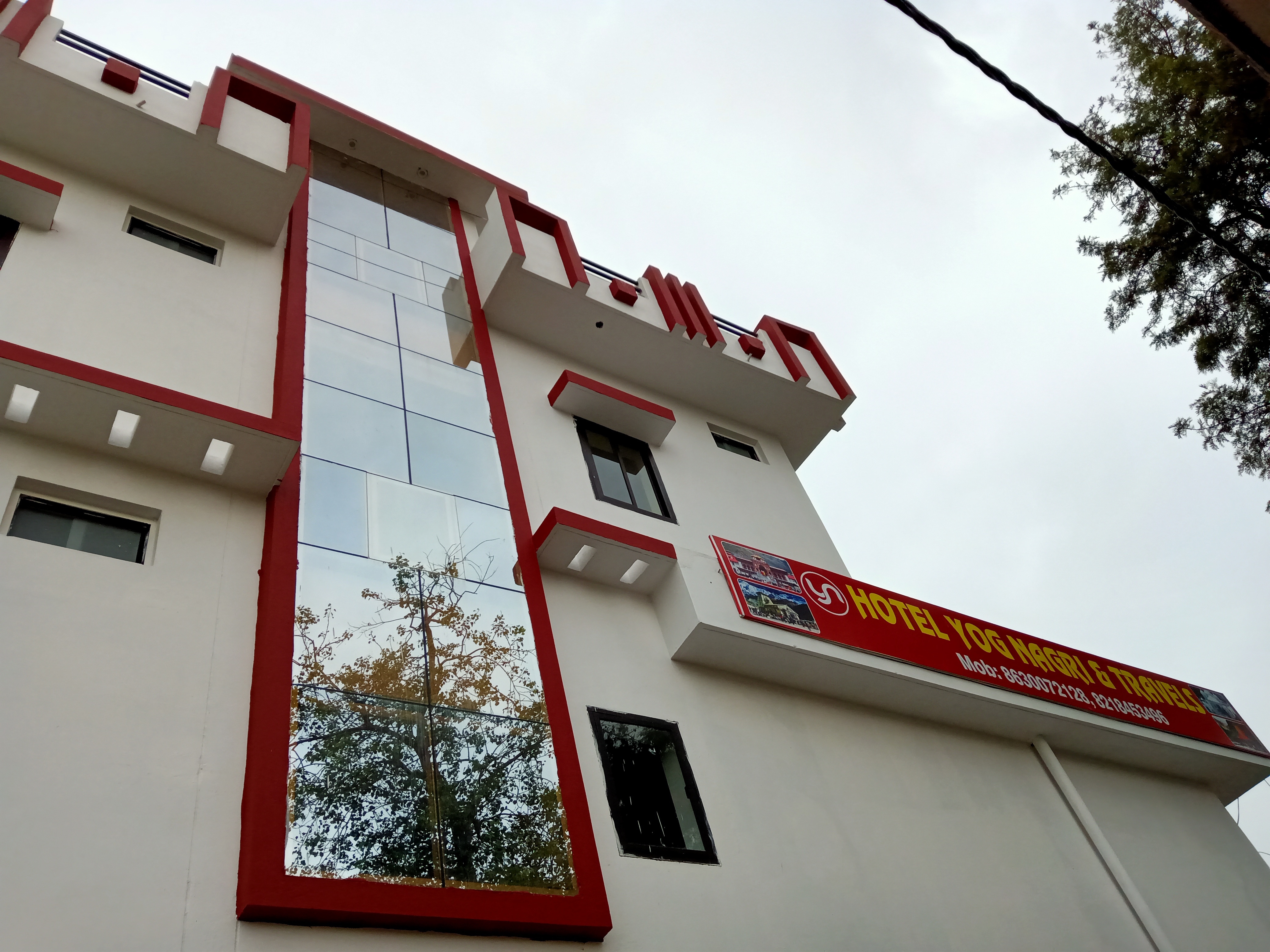 Hotel Yog Nagri - Tap to explore photos