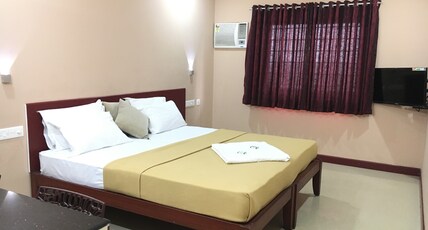Kalluvalappil Holiday Inn Room Type - DELUXE AC ROOM