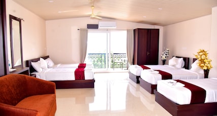 HOTEL COORG PALACE INN Room Type - Family group room With Balcony HOTEL COORG PALACE INN Room Type - Family group room With Balcony