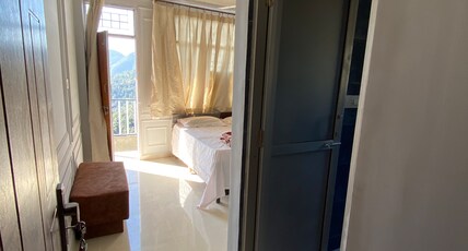 Parvata Droni Home Stay Room Type - Deluxe Room