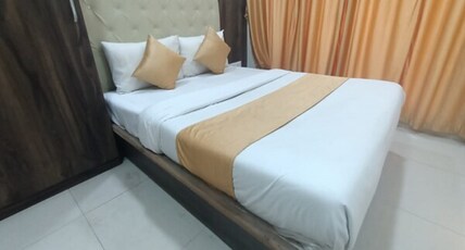 Hotel Om Sai Room Type - Deluxe Room