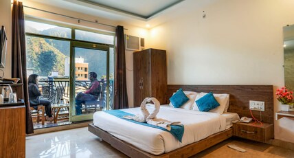 Pride Inn By Maps Hospitality Swimming Pool Room Type - Super Deluxe with Balcony View of Mountain - Free use of Swimming Pool Pride Inn By Maps Hospitality Swimming Pool Room Type - Super Deluxe with Balcony View of Mountain - Free use of Swimming Pool