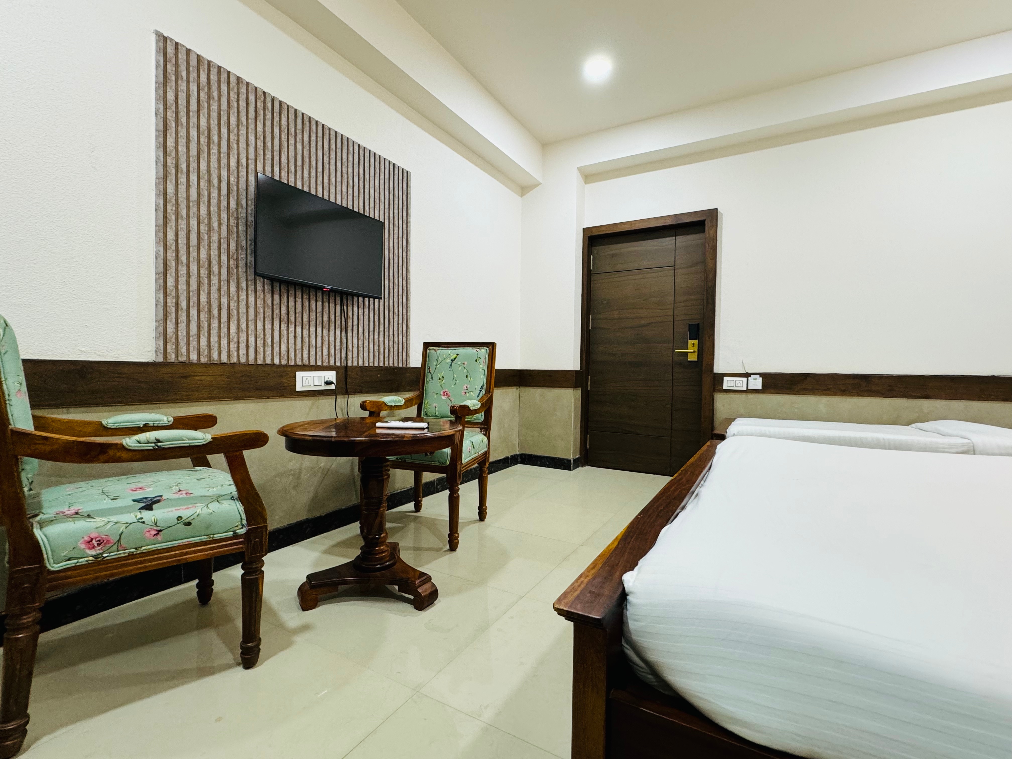 Hotel Tirth by Sonus - Tap to explore photos