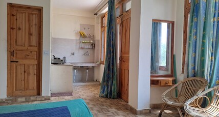 Sarthak Homestay Room Type - Standard Room with Kitchenette & Balcony