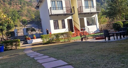 Camp Aquaforest Rishikesh Room Type - Riverside AC Cottage