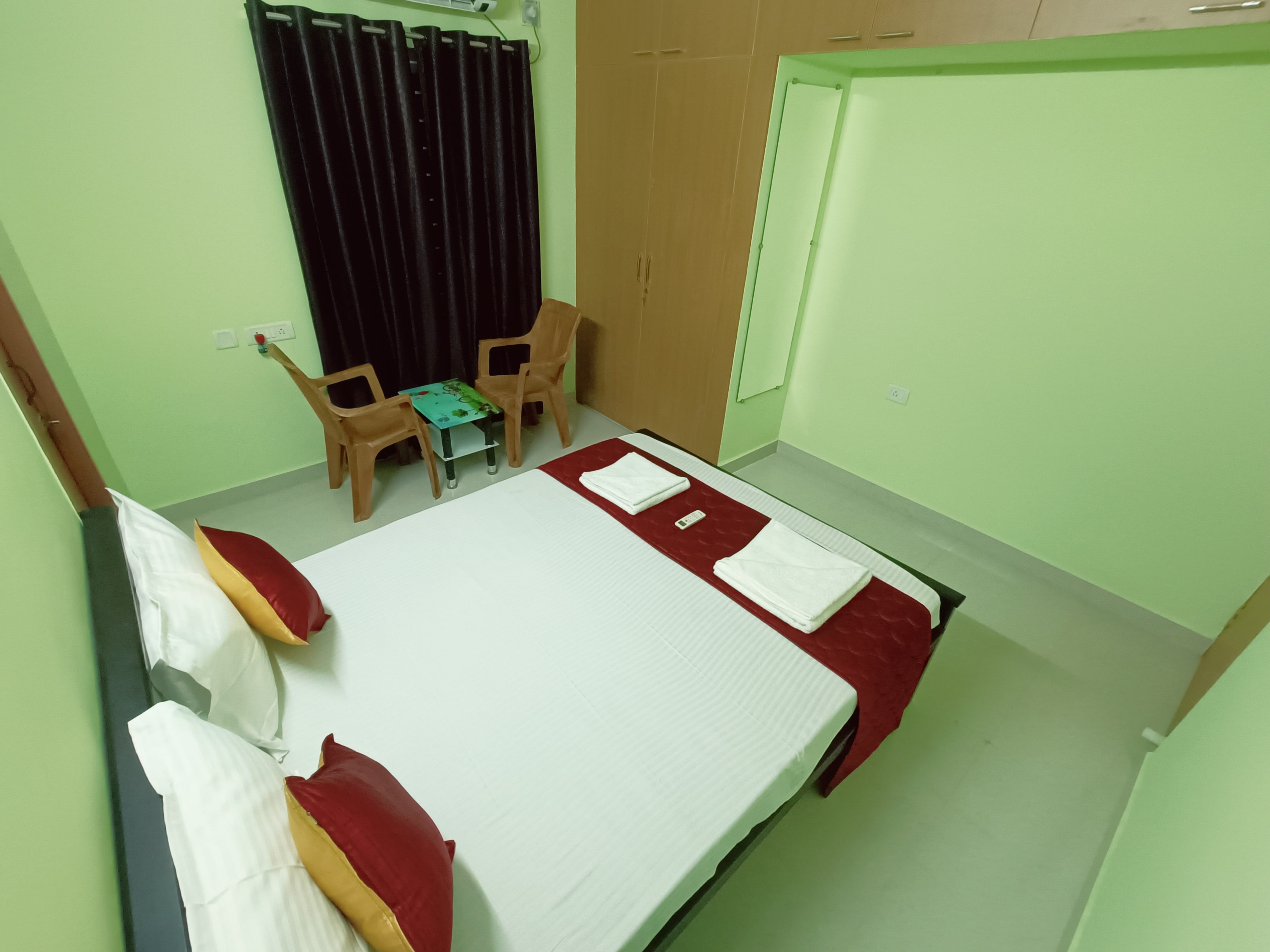 Ananya Service Apartments - Tap to explore photos