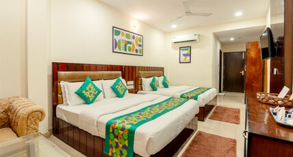 Treebo Red Coral Room Type - Deluxe Family Room