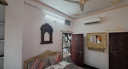 Raahi Backpacker's Hostel |Rooftop Restaurant at Lake Pichola| Room Type - Deluxe Double Bed Room