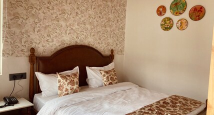 Naina Lodge Room Type - Naina Lodge (Balcony Room Brown - 3rd floor)