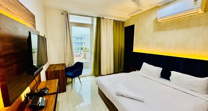 Palette Hotel & Convention Centre by CheckIn, Millennium City Gurugram Room Type - Premium King Room with Balcony