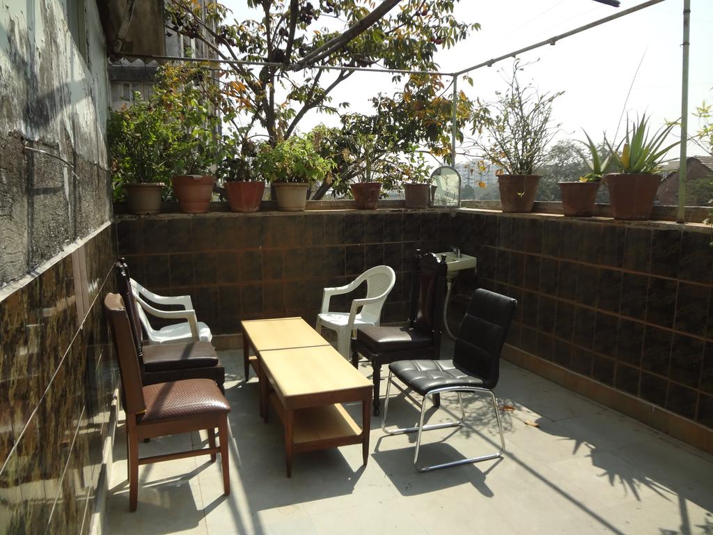 Hotel Happy Home Colaba - Tap to explore photos