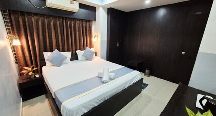 Pine Inn | ABC Bus Stand GS Road With Restaurant Room Type - Premium Suite Room With Private Living Room
