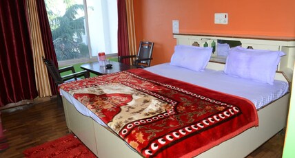Raturi Tourist Hotel New Tehri Room Type - Deluxe Room Raturi Tourist Hotel New Tehri Room Type - Deluxe Room