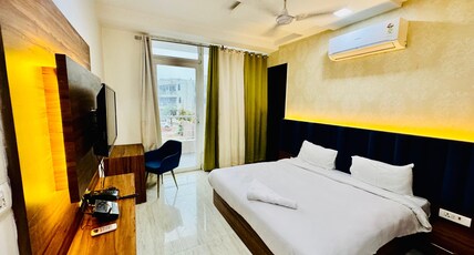 Palette Hotel & Convention Centre by CheckIn, Millennium City Gurugram Room Type - Premium Twin Room with Balcony