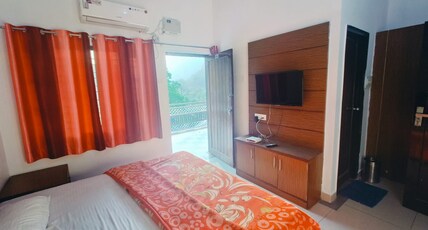 CP RESIDENCY Room Type - River View Deluxe Room AC