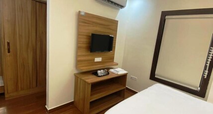 Hotel Shiv Sai Galaxy Lawn Room Type - Deluxe Room with Garden View King Bed