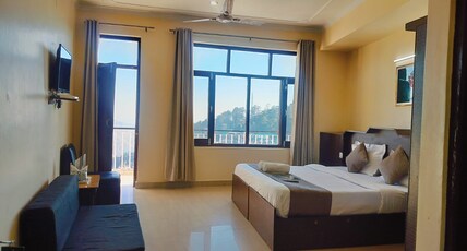 Soham Hotels  Main Square, McLeodganj Room Type - Deluxe Room with Private Balcony and Mountain View