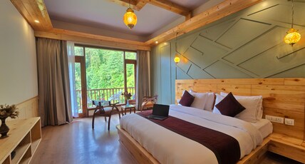 Wild Aura Homes | A Secluded Stay Room Type - Premium Rooms with Balcony (Forest-view)