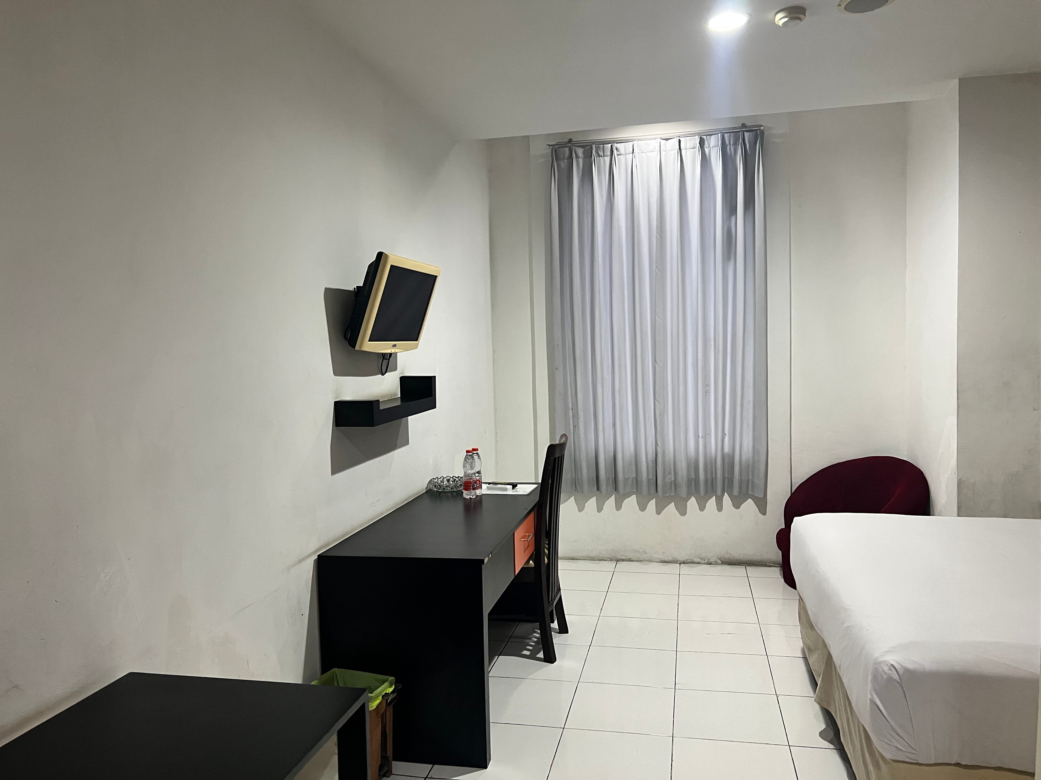 Hotel O Tri Homestay - Tap to explore photos