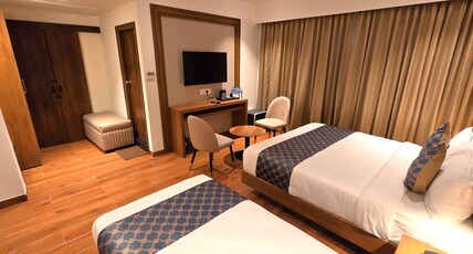 Hotel Liza Royale near Chennai Central Railway Station Room Type - Deluxe Triple Room