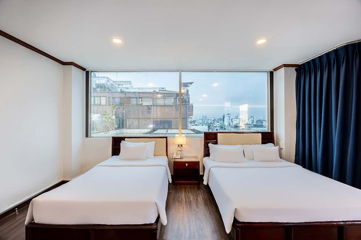 A25 Hotel - 251 Hai Ba Trung HCM - Tap to explore photos