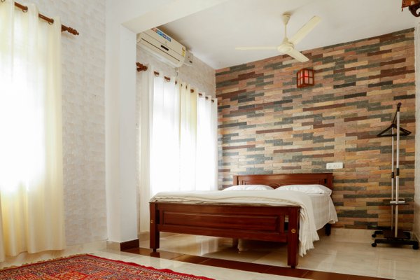 The Thomas Inn Homestay - Tap to explore photos