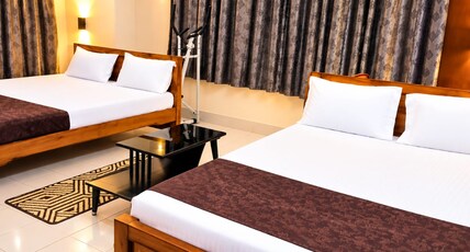 HOTEL PRITI RESIDENCY, NARENDRA KONA Room Type - DELUXE AC ROOM 4 PAX TEMPLE VIEW