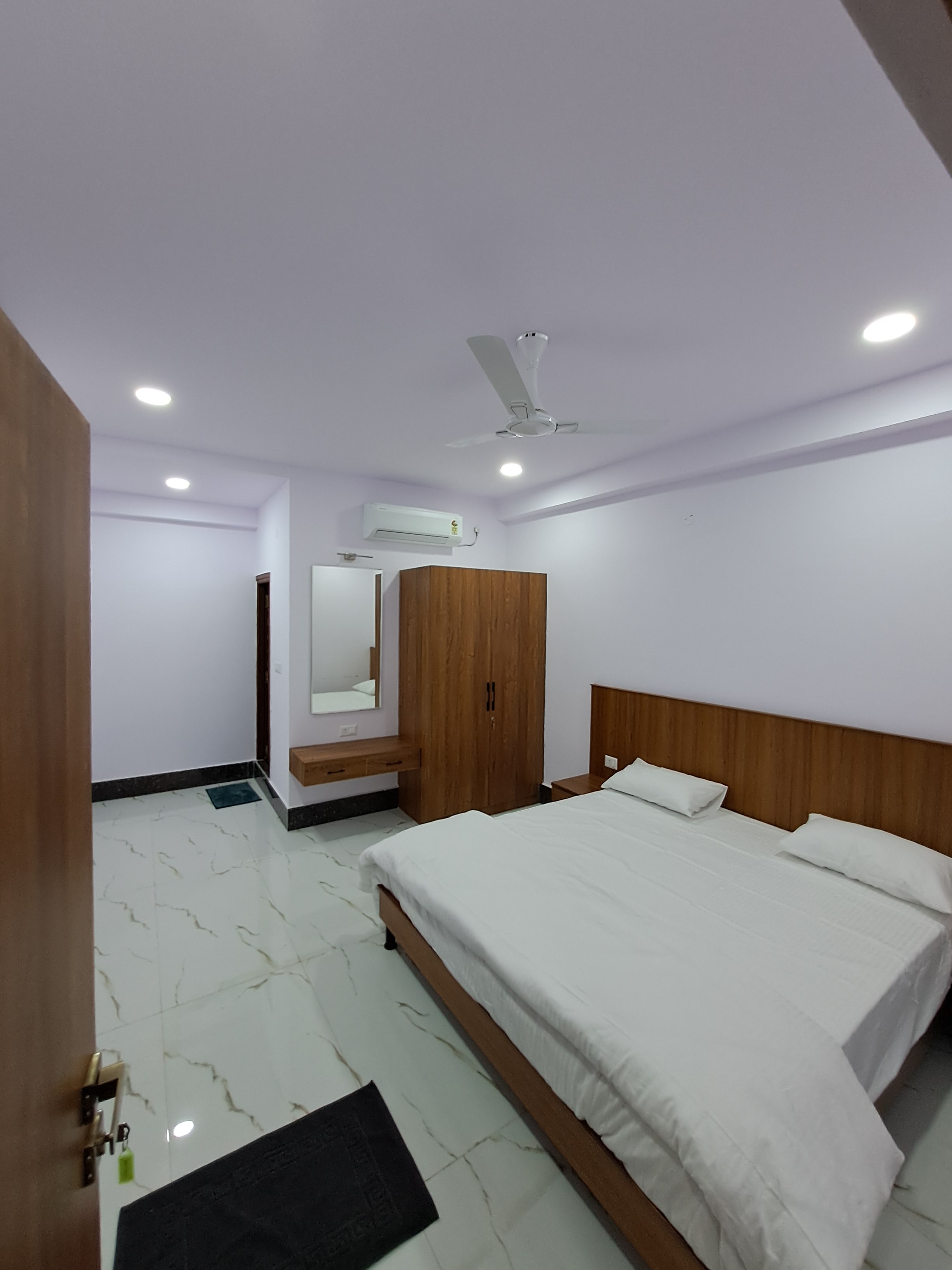 Ganesh Bhavan Rooms - Tap to explore photos