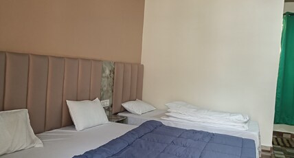 Bharat Guest House Govind Ghat Room Type - Semi Deluxe Tripple Bed Room Bharat Guest House Govind Ghat Room Type - Semi Deluxe Tripple Bed Room