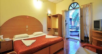 White orchid hotel Room Type - Deluxe Non AC