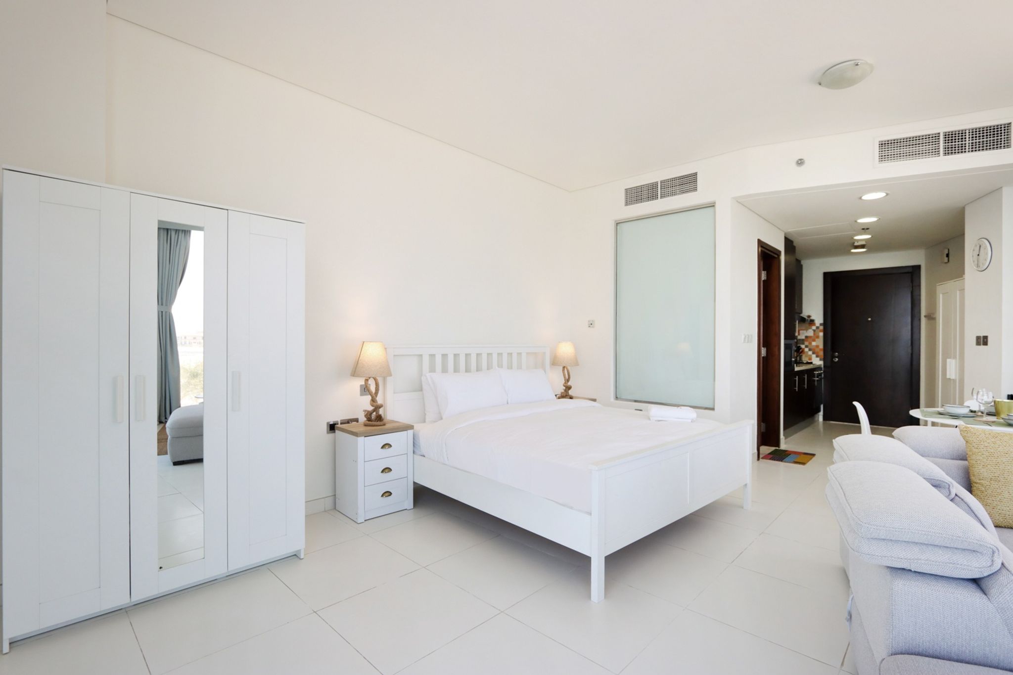 ELIVAAS Curated Beachfront Studio with Dining & Leisure Steps A - Tap to explore photos