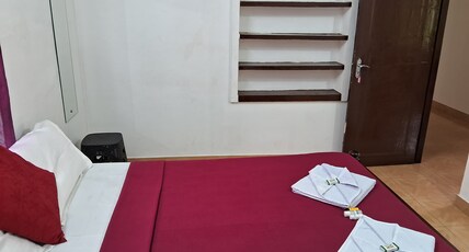 Homely Homestay Room Type - Deluxe Room