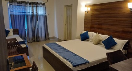 The Urban Escape Room Type - Deluxe AC Room with Balcony The Urban Escape Room Type - Deluxe AC Room with Balcony