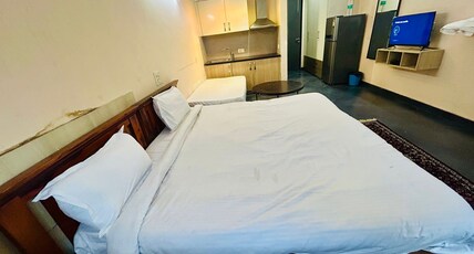 Samriddhi Studio Apartment Room Type - Family Deluxe Room with Smart TV, Wifi, Parking