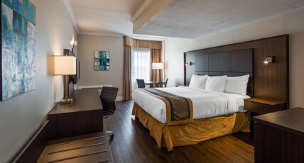 Best Western Laval-Montreal Room Type - 1 King Bed, Non-Smoking, Refrigerator, Wood Floor, Shower Only, Balcony, Full Breakfast Best Western Laval-Montreal Room Type - 1 King Bed, Non-Smoking, Refrigerator, Wood Floor, Shower Only, Balcony, Full Breakfast