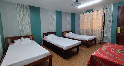 OYO 1229 Donya Thelma Ferrer Spring Resort Room Type - Standard Triple