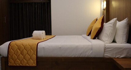 Munnar Isai Elanza Room Type - Deluxe Rooms