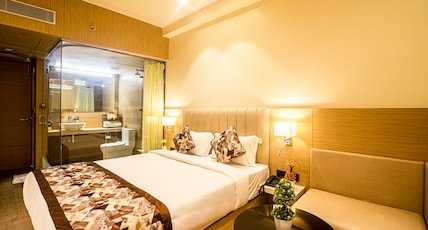 Ecotel Hotel Room Type - Premium Room , 24 hrs checkin and checkout , 15 percent discount on Food Bill Ecotel Hotel Room Type - Premium Room , 24 hrs checkin and checkout , 15 percent discount on Food Bill
