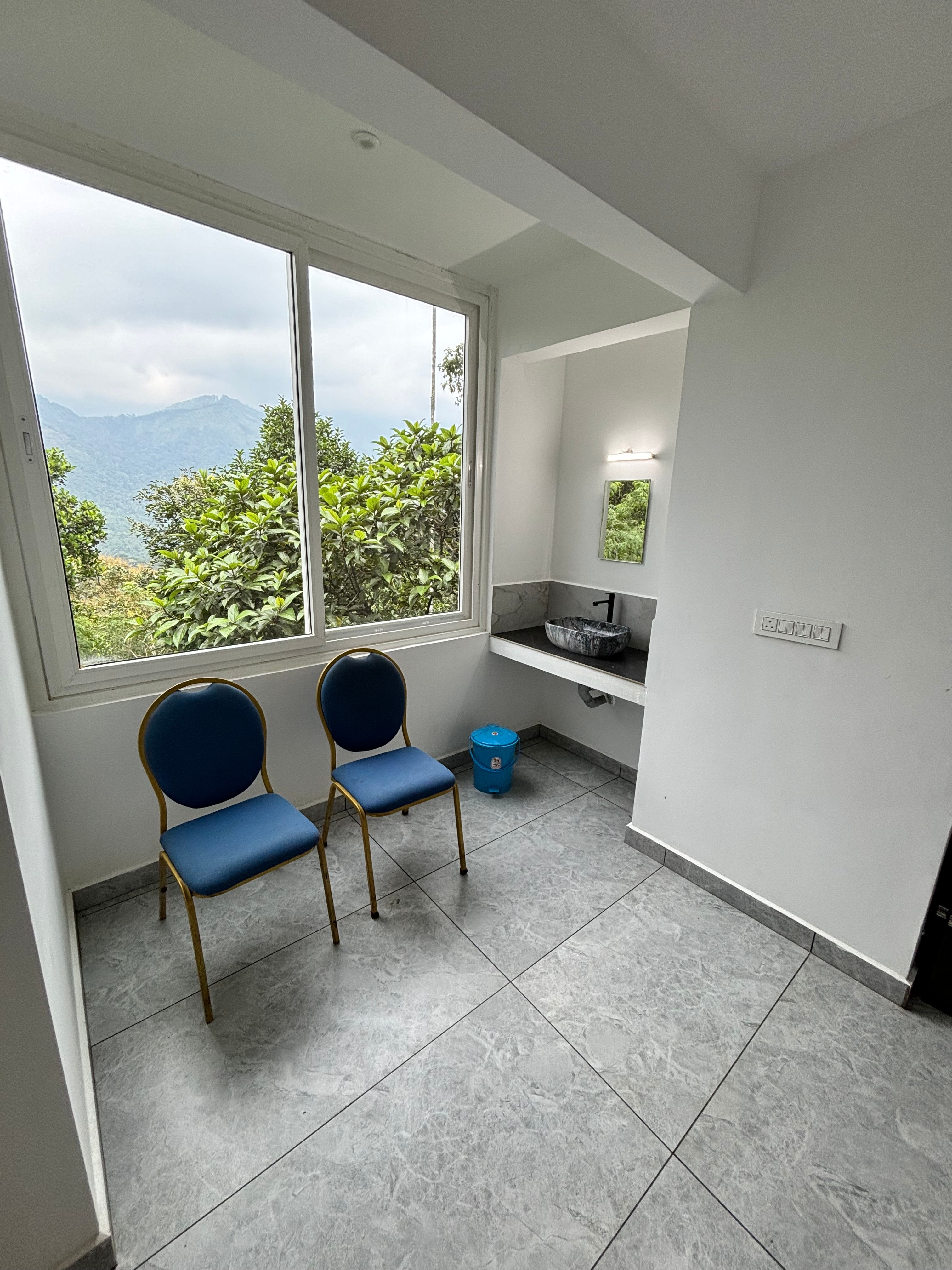 BLOOMS COTTAGE MUNNAR - Tap to explore photos