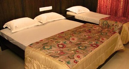 The Signature Inn Room Type - Deluxe Triple Bed AC Room