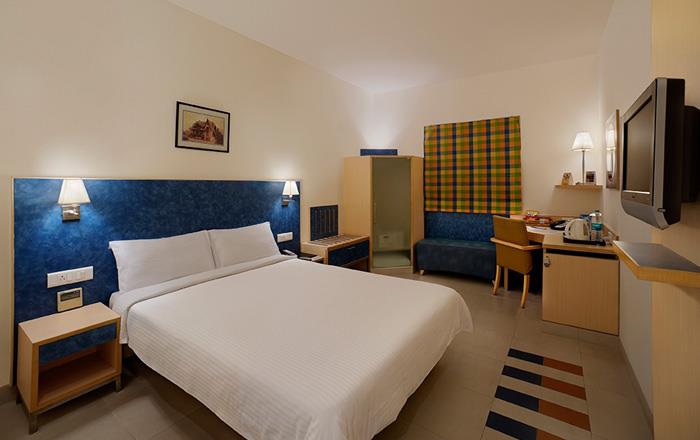 Radha Hometel Whitefield - A Sarovar Hotel - Tap to explore photos