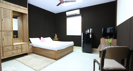 INCHARA FAMILY GARDEN RESTAURANT Room Type - Deluxe AC Room