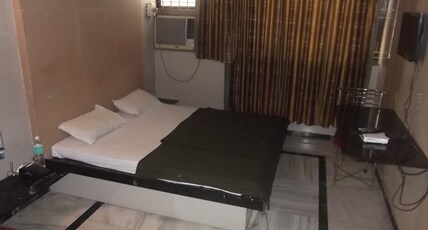 Hotel Radhika Room Type - Deluxe AC Room Hotel Radhika Room Type - Deluxe AC Room