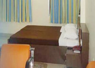 Hotel Ashoka Inn Room Type - Deluxe Room Hotel Ashoka Inn Room Type - Deluxe Room